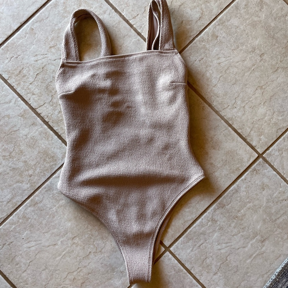 One piece wanderlust swim